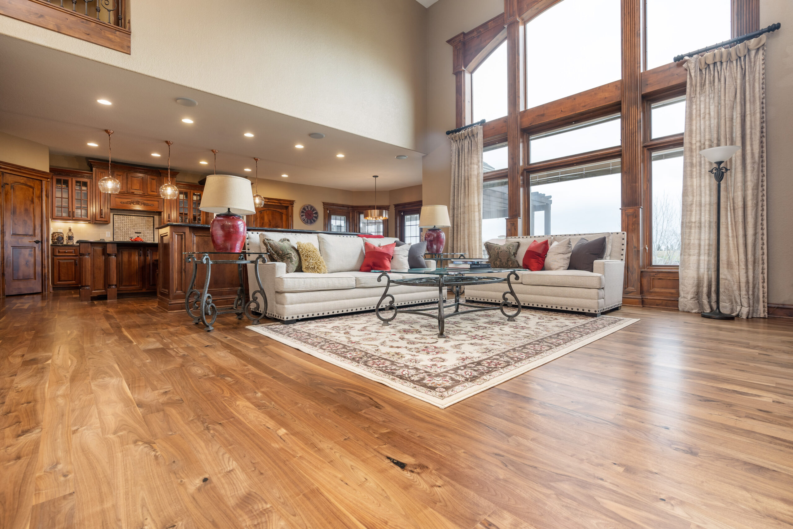 living room with shiny hardwood floors and an area rug